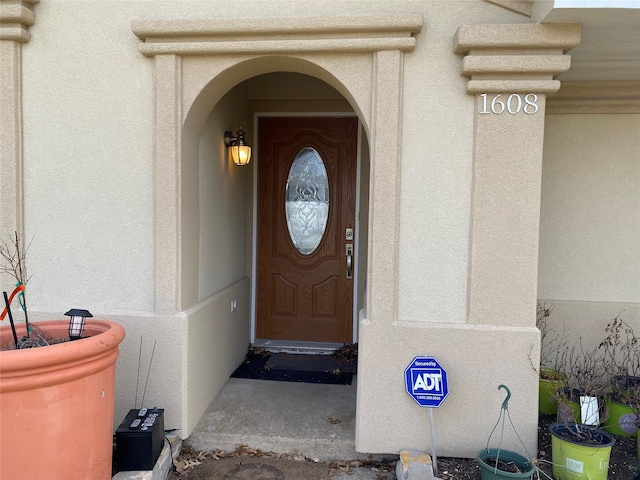 1608 University Dr, Richardson, TX 75081 - property entrance with stucco siding