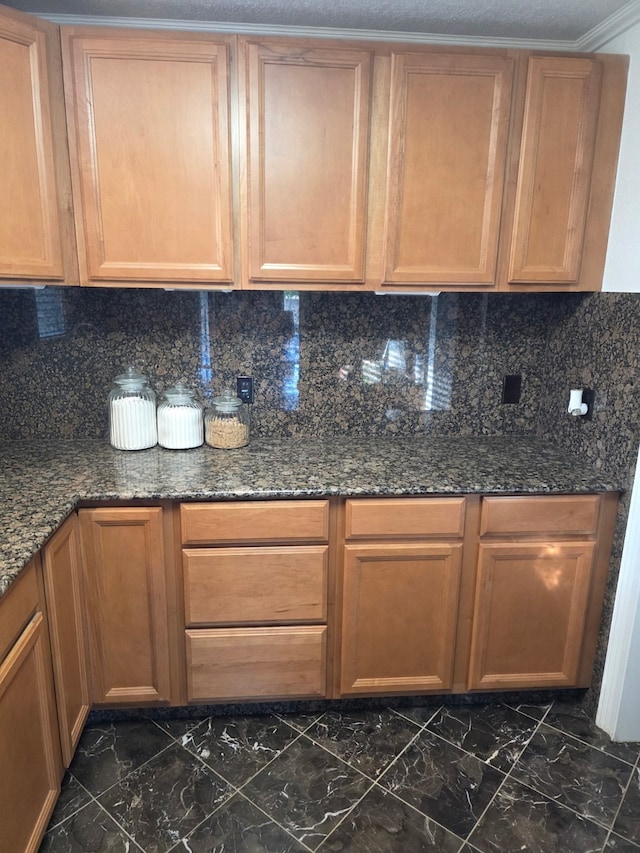 1608 University Dr, Richardson, TX 75081 - kitchen featuring dark marble finish flooring, decorative backsplash, and dark stone countertops