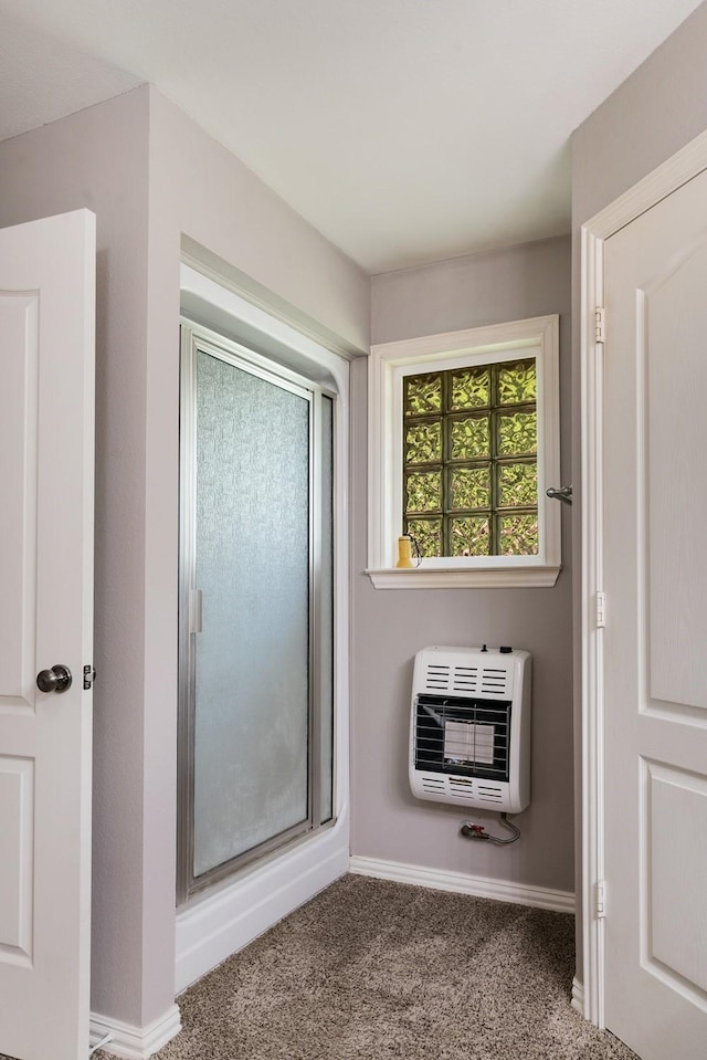 425 County Road 32230, Sumner, TX 75486 - bathroom featuring heating unit and baseboards
