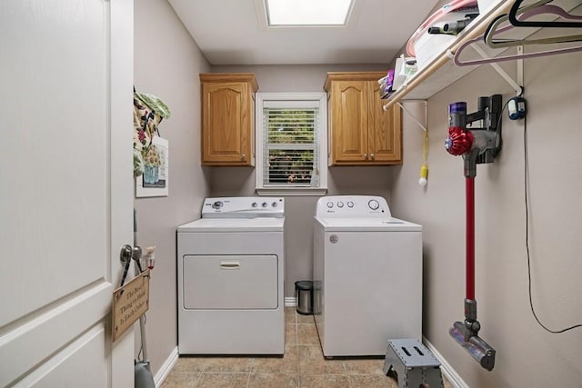 425 County Road 32230, Sumner, TX 75486 - laundry room featuring cabinet space, washing machine and clothes dryer, and baseboards