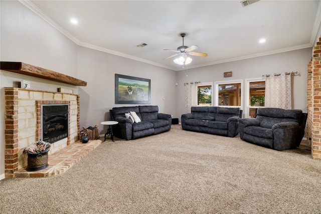 425 County Road 32230, Sumner, TX 75486 - carpeted living room featuring a brick fireplace, ceiling fan, crown molding, and recessed lighting