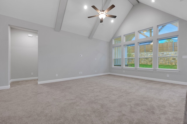 880 Brookwood Blvd, Haslet, TX 76052 - empty room with ceiling fan, high vaulted ceiling, light colored carpet, baseboards, and beam ceiling