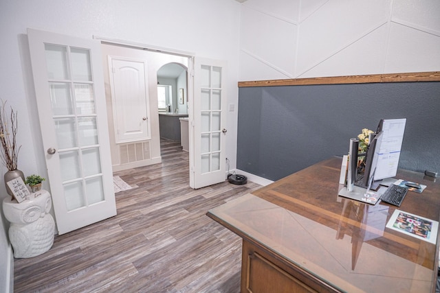 1025 N Churchill Dr, Fate, TX 75189 - office space with arched walkways, wood finished floors, french doors, and baseboards
