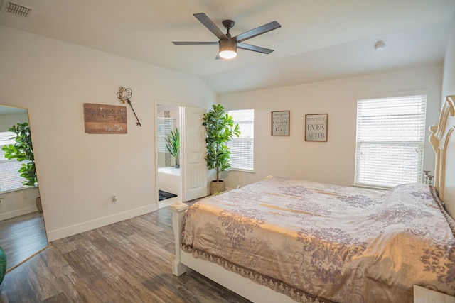1025 N Churchill Dr, Fate, TX 75189 - bedroom featuring wood finished floors, baseboards, multiple windows, vaulted ceiling, and ceiling fan