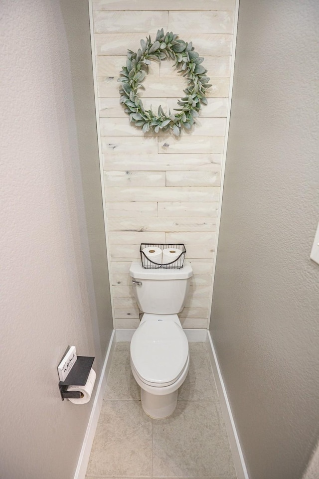 1025 N Churchill Dr, Fate, TX 75189 - bathroom with baseboards, tile patterned floors, and toilet