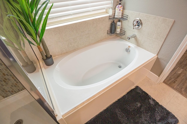1025 N Churchill Dr, Fate, TX 75189 - full bath featuring a bath, tile patterned floors, and baseboards