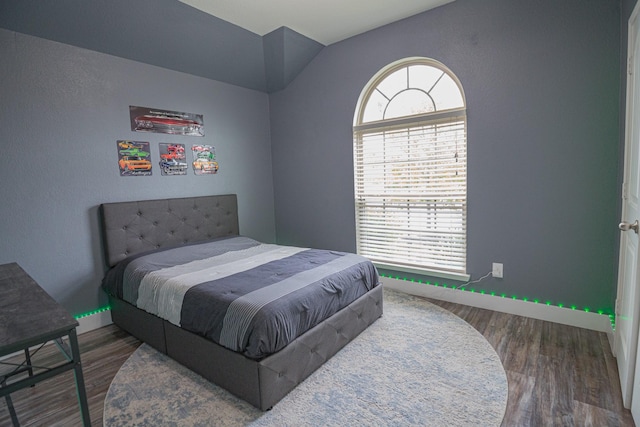 1025 N Churchill Dr, Fate, TX 75189 - bedroom featuring wood finished floors and baseboards