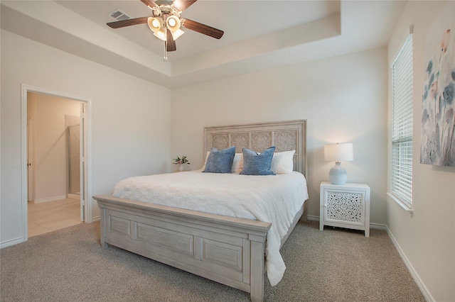 10337 Geode St, Aubrey, TX 76227 - bedroom featuring baseboards, multiple windows, a raised ceiling, and carpet