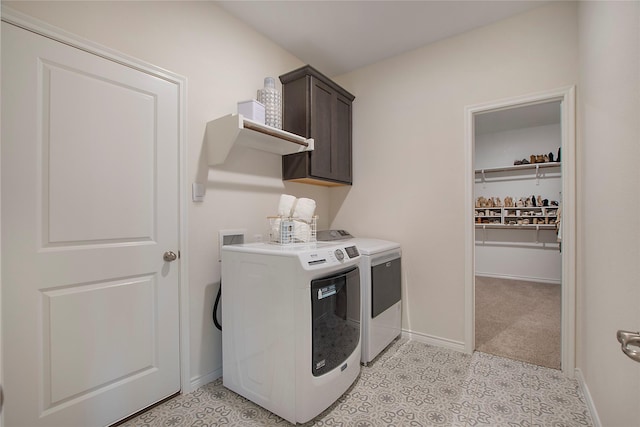 10337 Geode St, Aubrey, TX 76227 - washroom featuring washing machine and dryer, light tile patterned flooring, cabinet space, and baseboards