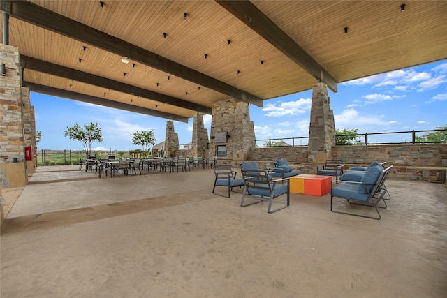 10337 Geode St, Aubrey, TX 76227 - view of patio featuring an outdoor living space with a fireplace and fence