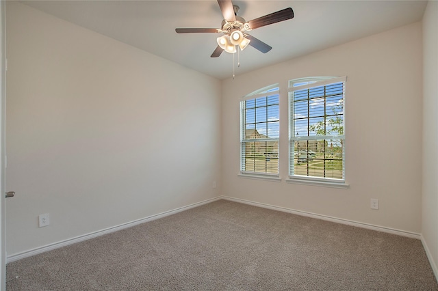 10337 Geode St, Aubrey, TX 76227 - spare room featuring ceiling fan, carpet floors, and baseboards