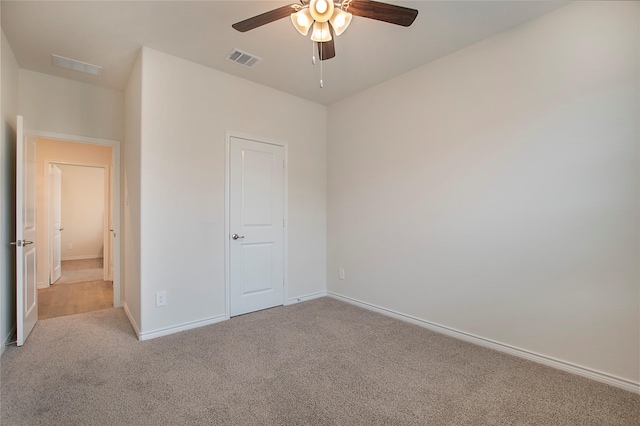 10337 Geode St, Aubrey, TX 76227 - unfurnished bedroom featuring ceiling fan, carpet floors, baseboards, and visible vents