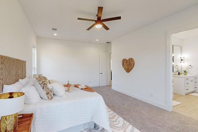 3791 Evergreen Ln, Caddo Mills, TX 75135 - bedroom with a ceiling fan, visible vents, baseboards, light colored carpet, and ensuite bath