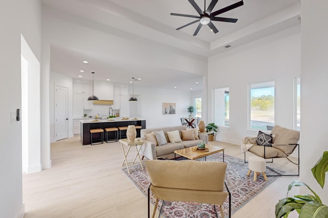 3791 Evergreen Ln, Caddo Mills, TX 75135 - living room featuring light wood-style floors, baseboards, a ceiling fan, and recessed lighting