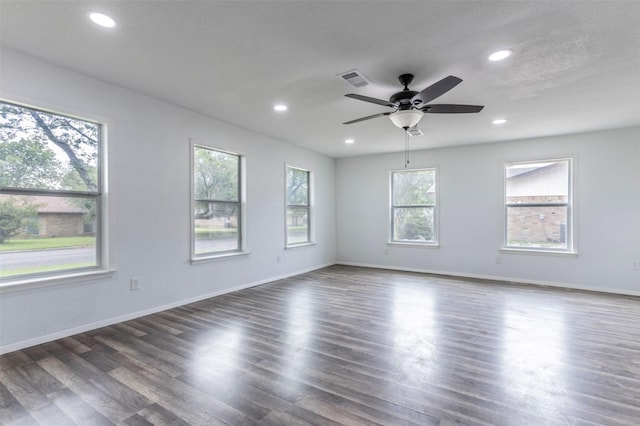337 Travis Ln, Hewitt, TX 76643 - unfurnished room featuring visible vents, recessed lighting, dark wood-style flooring, ceiling fan, and baseboards