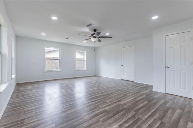337 Travis Ln, Hewitt, TX 76643 - empty room featuring a ceiling fan, recessed lighting, visible vents, and dark wood-type flooring