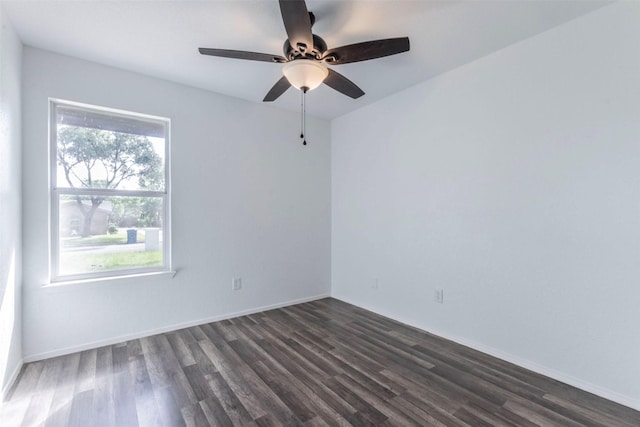 337 Travis Ln, Hewitt, TX 76643 - empty room with ceiling fan, baseboards, and dark wood-type flooring