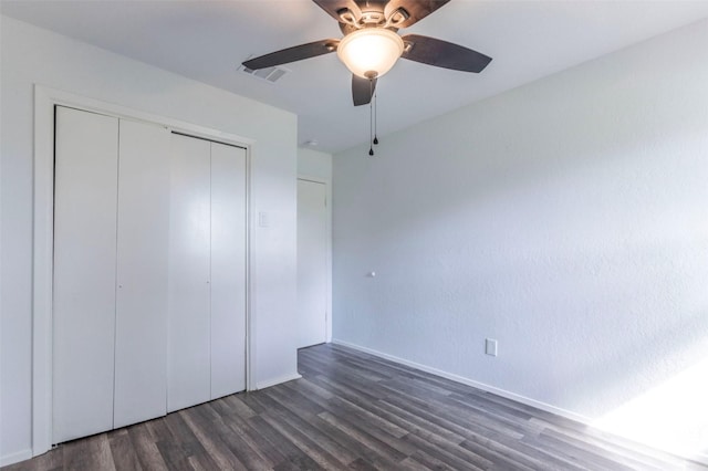 337 Travis Ln, Hewitt, TX 76643 - unfurnished bedroom featuring wood finished floors, a ceiling fan, a closet, visible vents, and baseboards