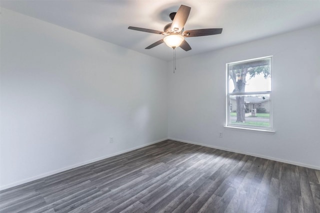 337 Travis Ln, Hewitt, TX 76643 - spare room with dark wood-style flooring, baseboards, and a ceiling fan