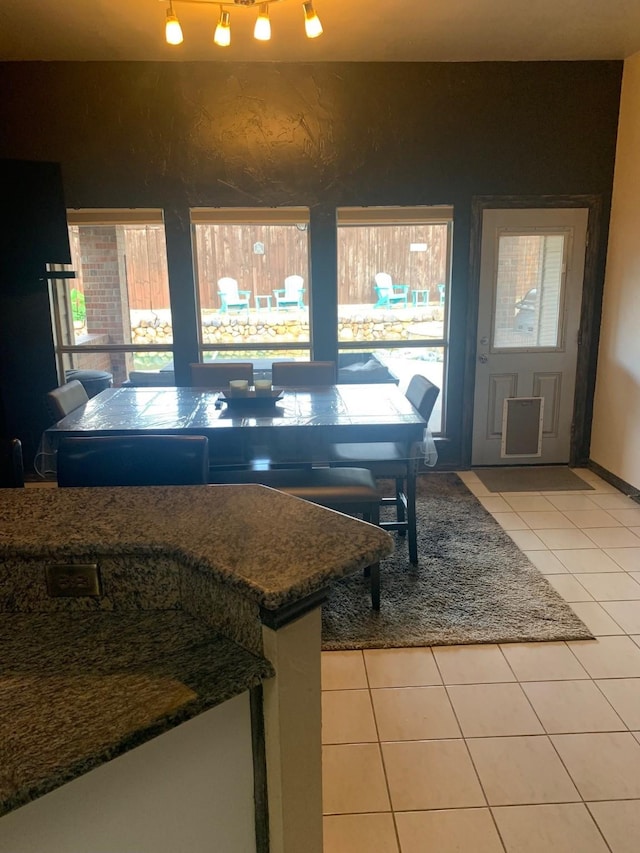 6001 Rock Cv, Flower Mound, TX 75028 - dining space featuring light tile patterned floors