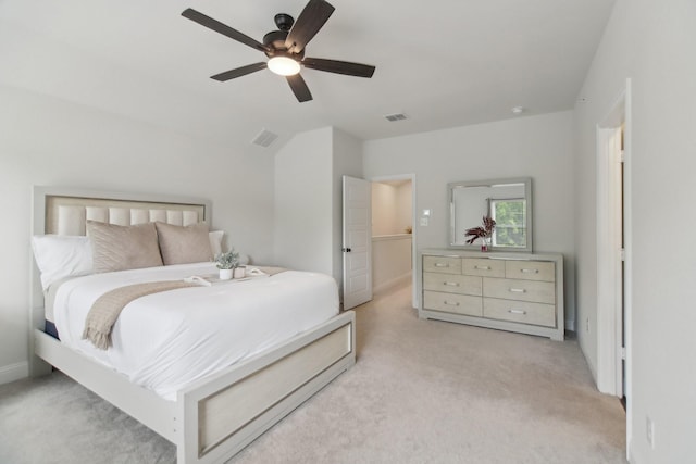 bedroom with light colored carpet, baseboards, a ceiling fan, and visible vents