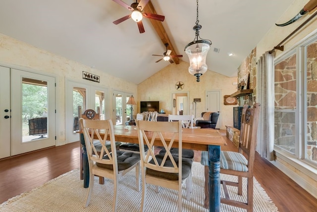 dining room featuring french doors, beam ceiling, wood finished floors, high vaulted ceiling, and ceiling fan