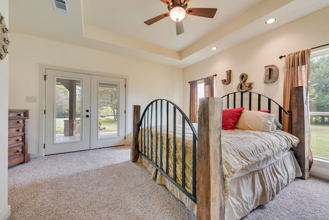 bedroom featuring carpet flooring, visible vents, french doors, and access to exterior