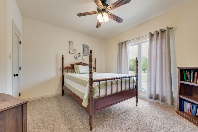 carpeted bedroom featuring access to outside and ceiling fan