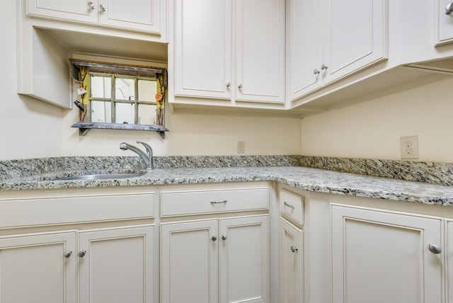 washroom featuring a sink