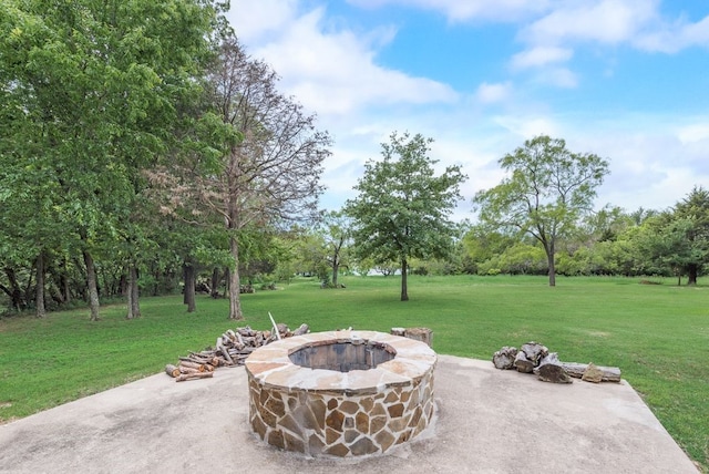 view of patio featuring a fire pit