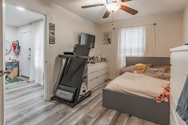 1100 Hillburn Dr, Dallas, TX 75217 - bedroom featuring light wood finished floors and a ceiling fan