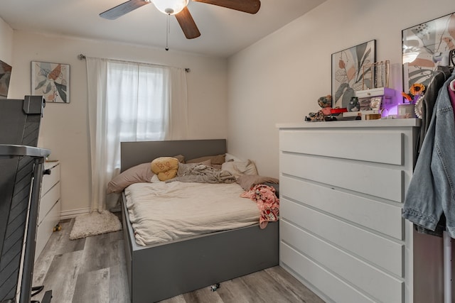 1100 Hillburn Dr, Dallas, TX 75217 - bedroom featuring ceiling fan and wood finished floors
