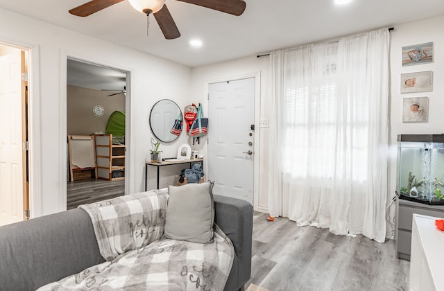 1100 Hillburn Dr, Dallas, TX 75217 - living area featuring wood finished floors, a ceiling fan, and recessed lighting