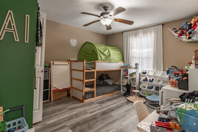 1100 Hillburn Dr, Dallas, TX 75217 - bedroom featuring ceiling fan and wood finished floors