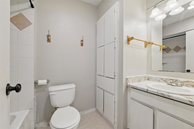 bathroom featuring toilet, shower / bath combination, tile patterned floors, baseboards, and vanity