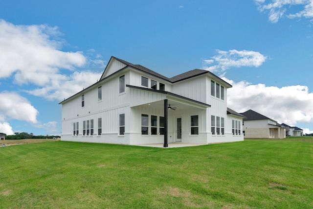 5614 Gaelic Dr, Celina, TX 75009 - rear view of property featuring board and batten siding, a ceiling fan, a patio area, a lawn, and a shingled roof