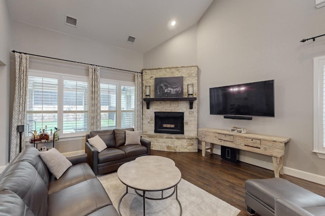 6404 Spring Wagon Dr, Mckinney, TX 75071 - living room featuring wood finished floors, baseboards, a fireplace, high vaulted ceiling, and recessed lighting