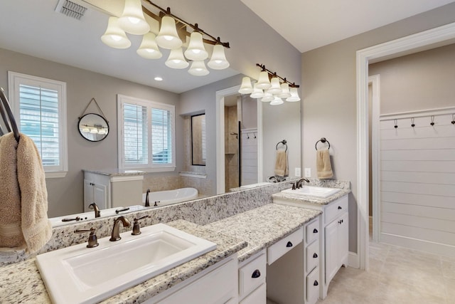 6404 Spring Wagon Dr, Mckinney, TX 75071 - full bath with a garden tub, double vanity, and tile patterned floors