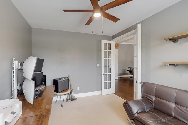 6404 Spring Wagon Dr, Mckinney, TX 75071 - home office featuring french doors, ceiling fan, and wood finished floors