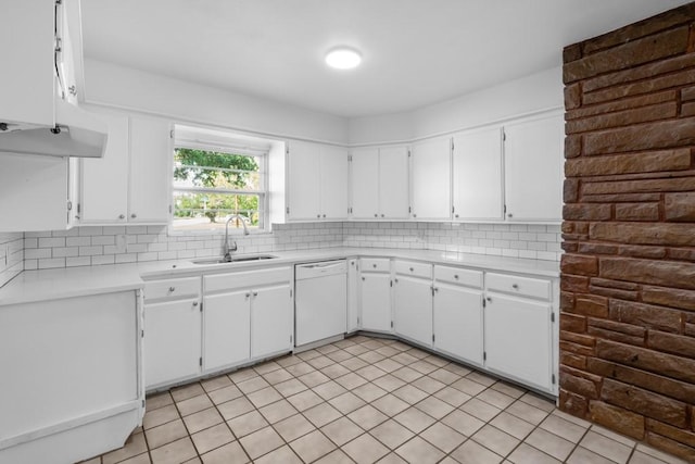 2349 Cooke St, Abilene, TX 79605 - kitchen with white dishwasher, a sink, light countertops, and white cabinetry