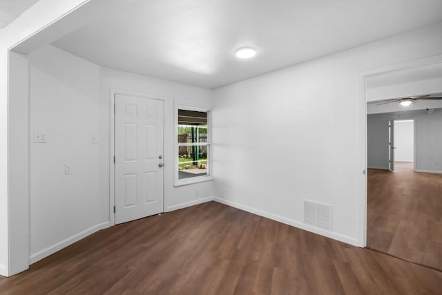 2349 Cooke St, Abilene, TX 79605 - spare room featuring dark wood-style flooring and baseboards