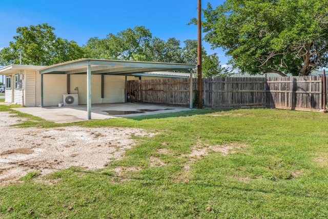2349 Cooke St, Abilene, TX 79605 - view of yard with a carport, dirt driveway, and ac unit