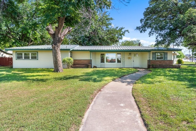 2349 Cooke St, Abilene, TX 79605 - single story home featuring a front lawn and metal roof
