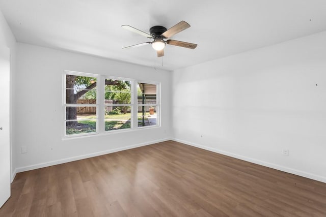 2349 Cooke St, Abilene, TX 79605 - spare room with wood finished floors, ceiling fan, and baseboards