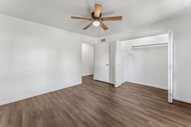 2349 Cooke St, Abilene, TX 79605 - unfurnished bedroom with wood finished floors, a closet, baseboards, and a ceiling fan