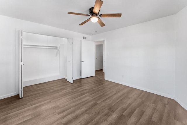 2349 Cooke St, Abilene, TX 79605 - unfurnished bedroom featuring wood finished floors, baseboards, a closet, and a ceiling fan