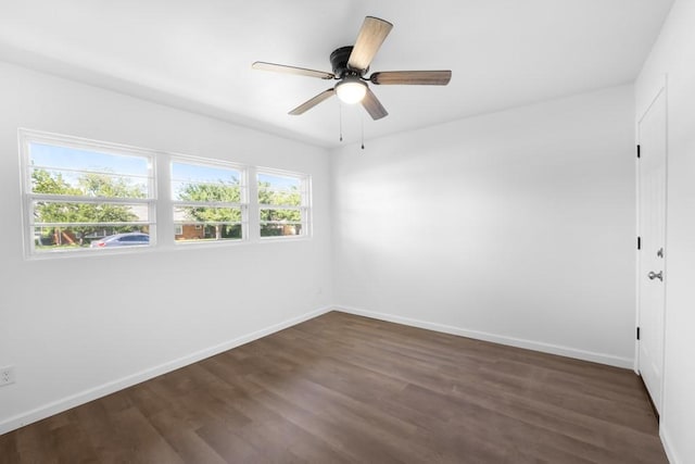 2349 Cooke St, Abilene, TX 79605 - unfurnished room with dark wood-style floors, baseboards, and a ceiling fan