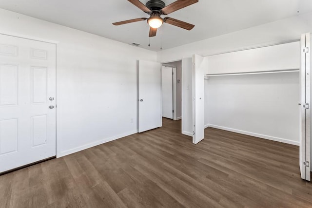 2349 Cooke St, Abilene, TX 79605 - unfurnished bedroom with baseboards, wood finished floors, a closet, and a ceiling fan