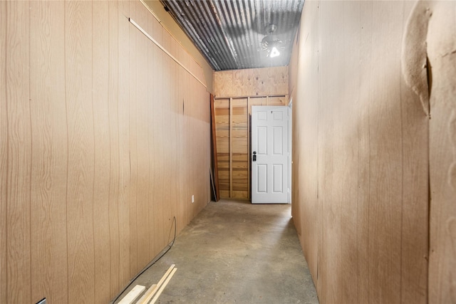 2230 Farm Road 79, Paris, TX 75460 - hall featuring wood walls and concrete flooring