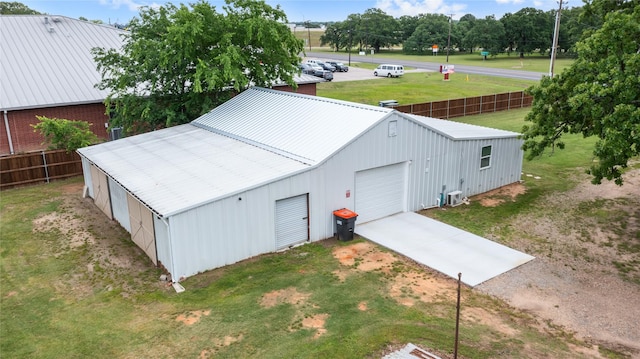 2230 Farm Road 79, Paris, TX 75460 - view of pole building with a yard, driveway, and fence